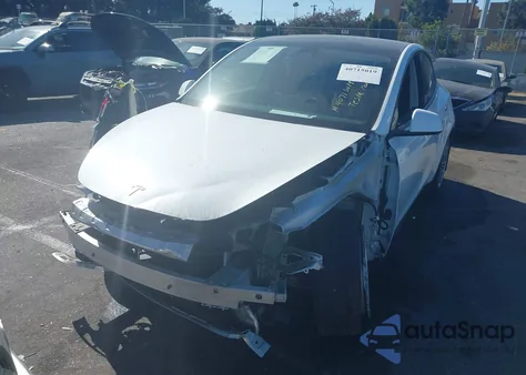 2022 Tesla Model Y Long Range Dual Motor All-Wheel Drive from USA, damaged, VIN 7SAYGAEE5NF493968